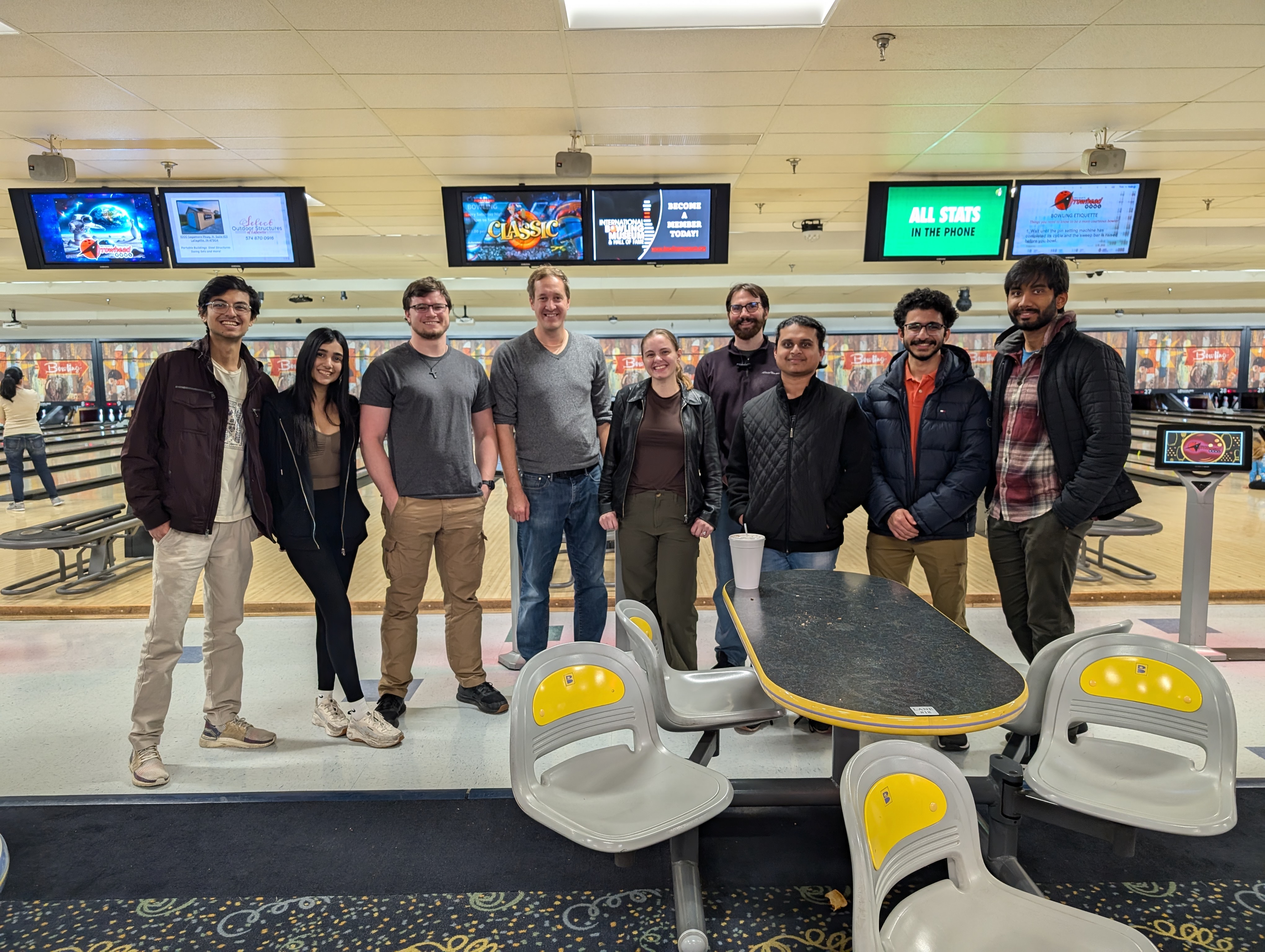 Members of the Hood Lab at a group bowling outing